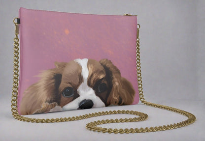 leather bag with gold chain featuring dog portrait