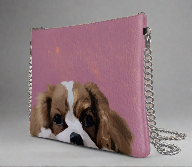 leather bag with gold chain featuring dog portrait